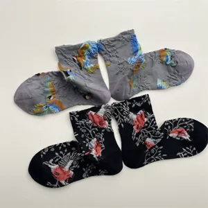 Vintage embroidered cotton mid-calf socks featuring cute bird and floral patterns for women.
