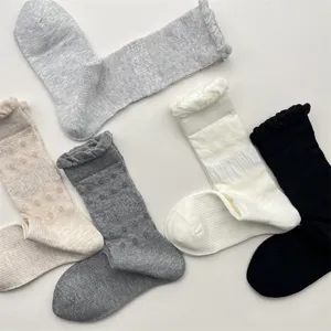Mesh ruffle slouch socks detail view, breathable cotton mid-calf socks in assorted colors.