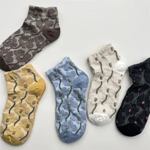 Retro floral short socks detail view, breathable cotton blend with 3d embossed flower patterns.