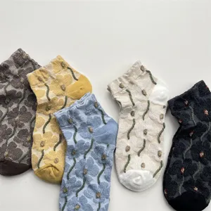 Detail view of Korean style retro floral relief short socks, breathable cotton low-cut socks.