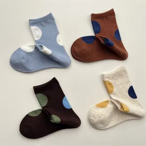Cute polka dot mid-calf socks for women, vintage cotton socks with colorful dots, cozy daily wear.