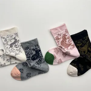 Vintage style women cotton mid-tube socks featuring cute animal and plant floral patterns for autumn winter.