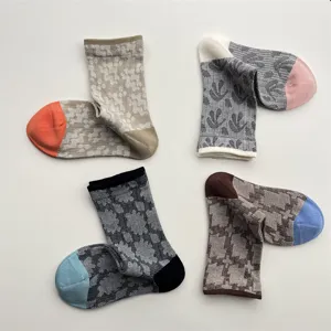 Japanese vintage color block geometric pattern mid-calf cotton socks for women detail view.