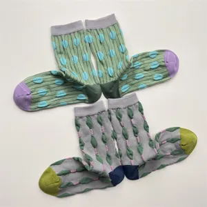 Detailed view of women cotton mid-calf socks with cute polka dot and 3D textured pattern.