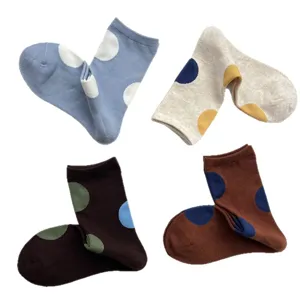 Cute polka dot crew socks for women, casual soft cotton mid-calf socks, winter fashion.