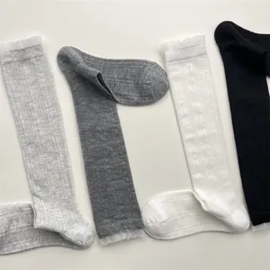 Women thin calf socks with delicate lace trim, breathable solid color design for summer.