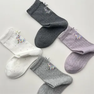 Sweet Korean style mid-calf cotton socks with cute bows and floral patterns for women autumn