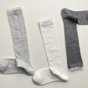 Spring summer women solid color lace trim mid-calf socks breathable mesh design detail.