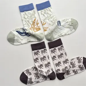 Chaussettes mi-hautes mignonnes en coton avec broderie d'oiseaux et zèbres pour femmes automne.