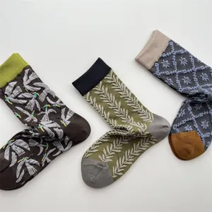 Detail view of Japanese retro vintage wheat relief and bird pattern women cotton socks.
