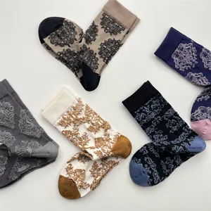 Retro embossed floral mid-tube socks, comfortable autumn winter vintage cotton socks women.