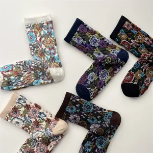 Detailed view of vintage embossed floral mid-calf socks with breathable cotton fabric.
