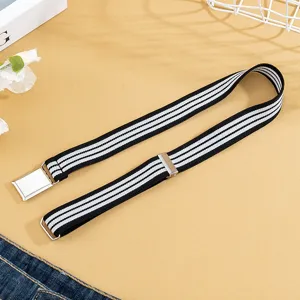 Children black white striped elastic belt detail showing adjustable metal buckle and fabric.