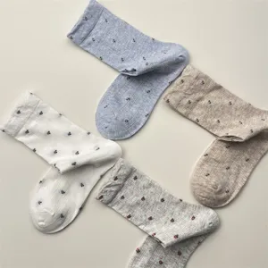 Detailed view of retro floral mesh mid-tube socks showcasing breathable cotton fabric and cute pattern.
