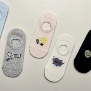 Close-up detail of breathable mesh low-cut boat socks with cute cartoon embroidery.