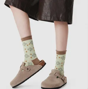 Vintage floral women socks detail view, featuring cute ribbed mid-calf design and soft cotton.