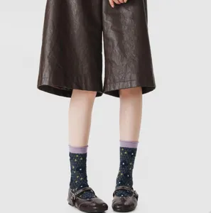 Retro floral women mid-tube socks contrast roll edge vintage cotton socks detail view.