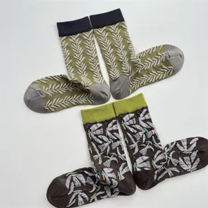 Retro vintage literary relief leaf and bird pattern women cotton mid-calf socks detailed view.