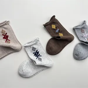 Women's cute argyle bow mid-calf socks cotton retro rolled edge slouch socks detail