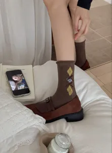 Korean retro rolled-edge argyle mid-tube cotton socks with cute bow details for autumn winter.