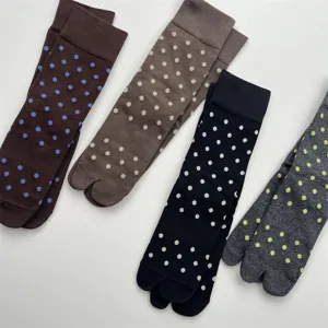 Detailed view of Japanese style cute polka dot split toe socks, cotton mid calf hosiery.