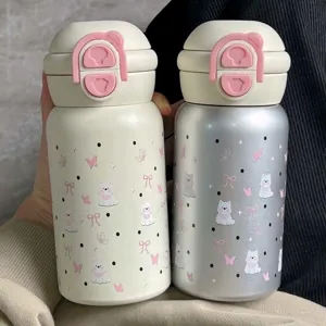 Stainless steel cute water bottle detail, vacuum insulated thermos cup with straw and bear lock design.