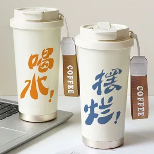 Stainless steel insulated coffee cup with portable strap, minimalist style water tumbler for students.