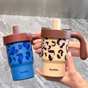 Detailed view of the cute portable leopard print stainless steel insulated tumbler with straw.