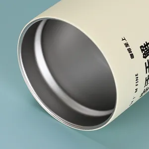 Stainless steel tumbler cup inner detail, double wall vacuum insulated coffee cup close up view.