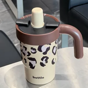 Cute leopard print stainless steel insulated tumbler with straw and handle for car and office.