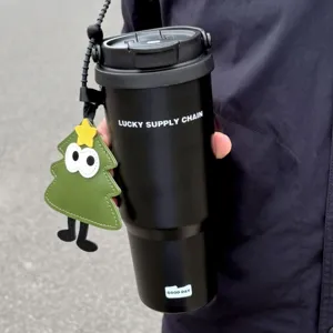 Large capacity stainless steel thermos mug with portable handle and cute Christmas tree charm.