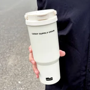 Stainless steel outdoor travel thermos cup detail showing portable handle and modern design.
