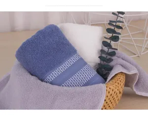 Juego de toallas de algodón suave y absorbente, color liso para uso diario en el hogar.