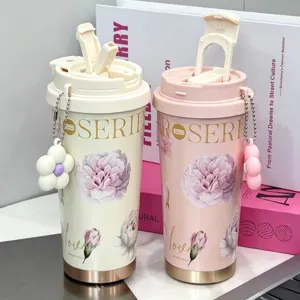 Stainless steel insulated tumbler with straw and cute flower pendant, aesthetic floral travel coffee mug.