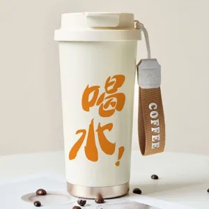 Portable 304 stainless steel coffee cup detail view, featuring minimalist design and handy strap.