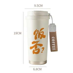 Stainless steel insulated coffee cup with portable strap and minimalist design for students.