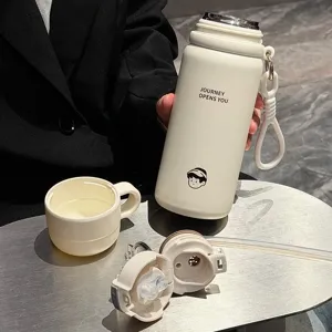 Stainless steel insulated water bottle detail showing straw, dual lids, and clean white body.