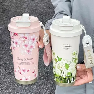 Tragbarer Edelstahl Thermobecher mit Handschlaufe, stilvolles Blumen Design fuer das Buero.