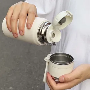 Bouteille isotherme portable en acier inoxydable 316 avec sangle pour le sport en plein air.