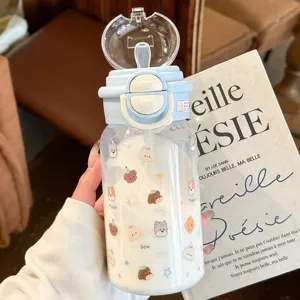 Cute portable plastic water bottle with straw and cute puppy pattern for students and daily use.