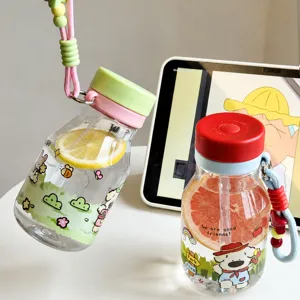 Cute cartoon straw water bottle with fruit slice design and portable lanyard for kids.