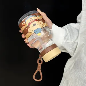 Cute cartoon printed portable straw water bottle with silicone strap for kids students.