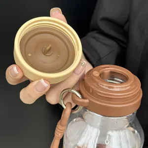 Portable water bottle leak-proof cup lid detail view cute student straw tumbler design