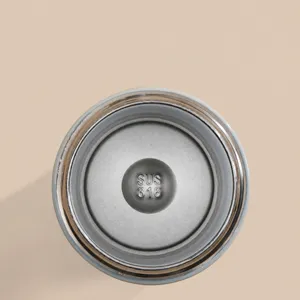 Stainless steel thermos cup inner lid view, durable portable vacuum flask for outdoor drinks.