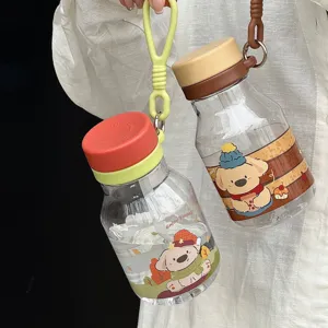 Cute cartoon straw water cup detail showing portable design with lovely pet graphics and lanyard.