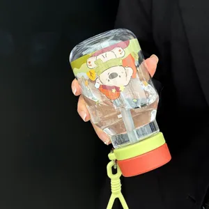 Portable plastic water bottle with cute cartoon bear print, straw and colorful lid for daily use.
