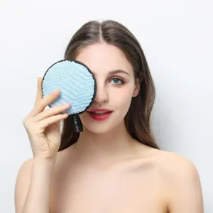Reusable microfiber makeup remover pad, soft facial cleansing sponge for daily skin care routine.
