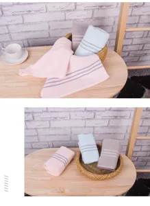 Pure cotton striped face towel detail showing soft texture, thick absorbent design in colors.