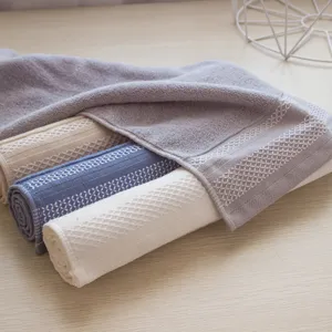 Juego de toallas de cara absorbentes de algodón suave, toalla de baño lisa para uso doméstico.