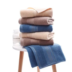 Pure cotton thickened soft face towel set in assorted solid colors, neatly stacked for daily home use.